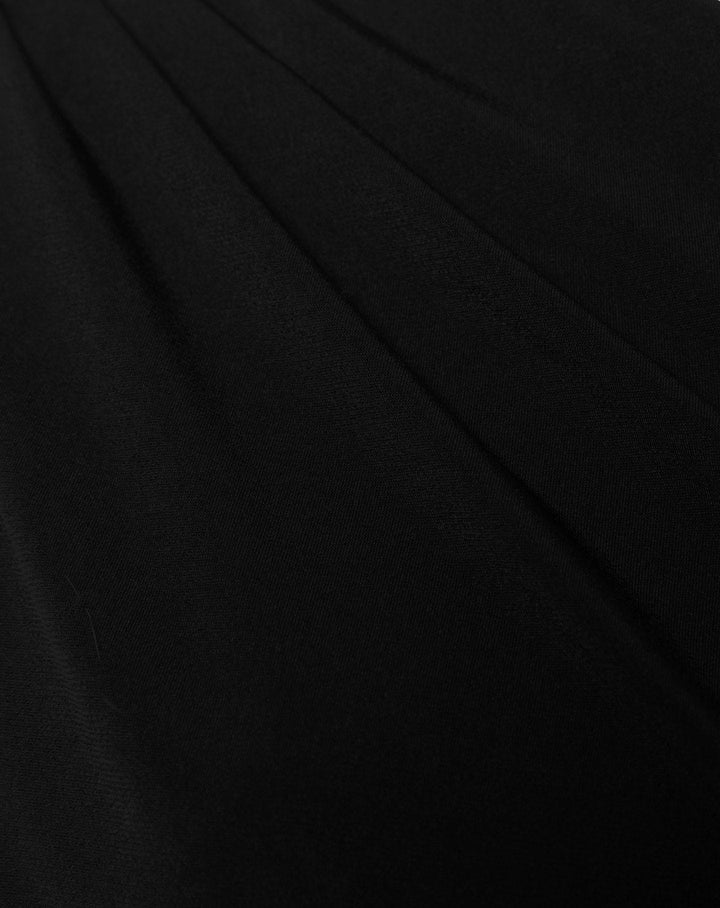 TOP SANS MANCHES RUFFLE NOIR